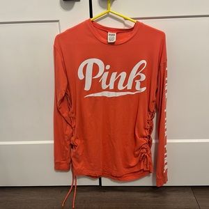 Pink long sleeved shirt
